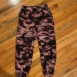 Marbled pink and black long pants with 2 pockets and string to make tighter